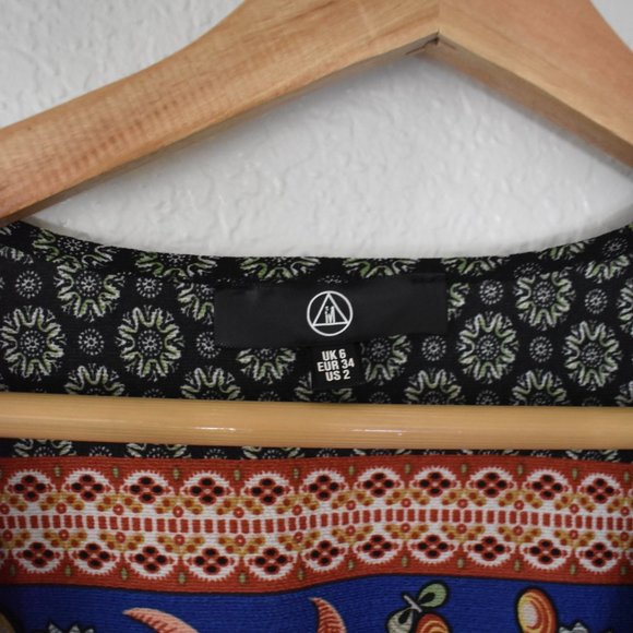 Missguided Mixed Print Bell Sleeve Wrap Romper - Picture 10 of 12